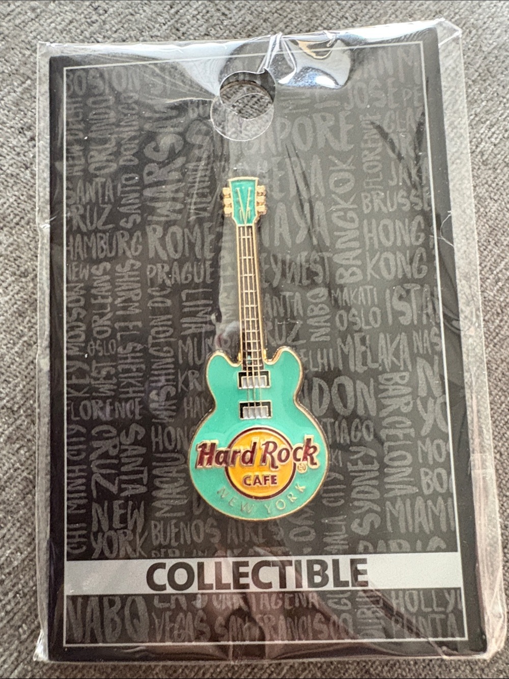 Hard Rock Cafe Turquoise and Gold Guitar Pin - New York